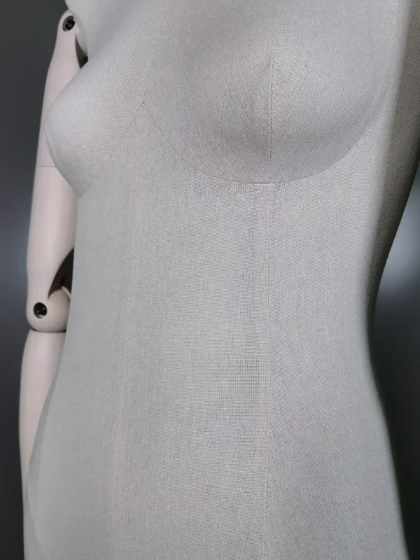 Close-up of XINTU premium fabric half body female mannequin with white linen texture and wooden arms