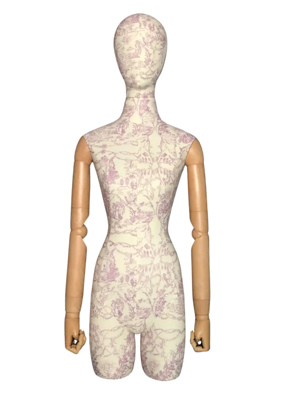 fabric female mannequin with floral fabric surface and articulated wooden arms for boutique fashion retail display