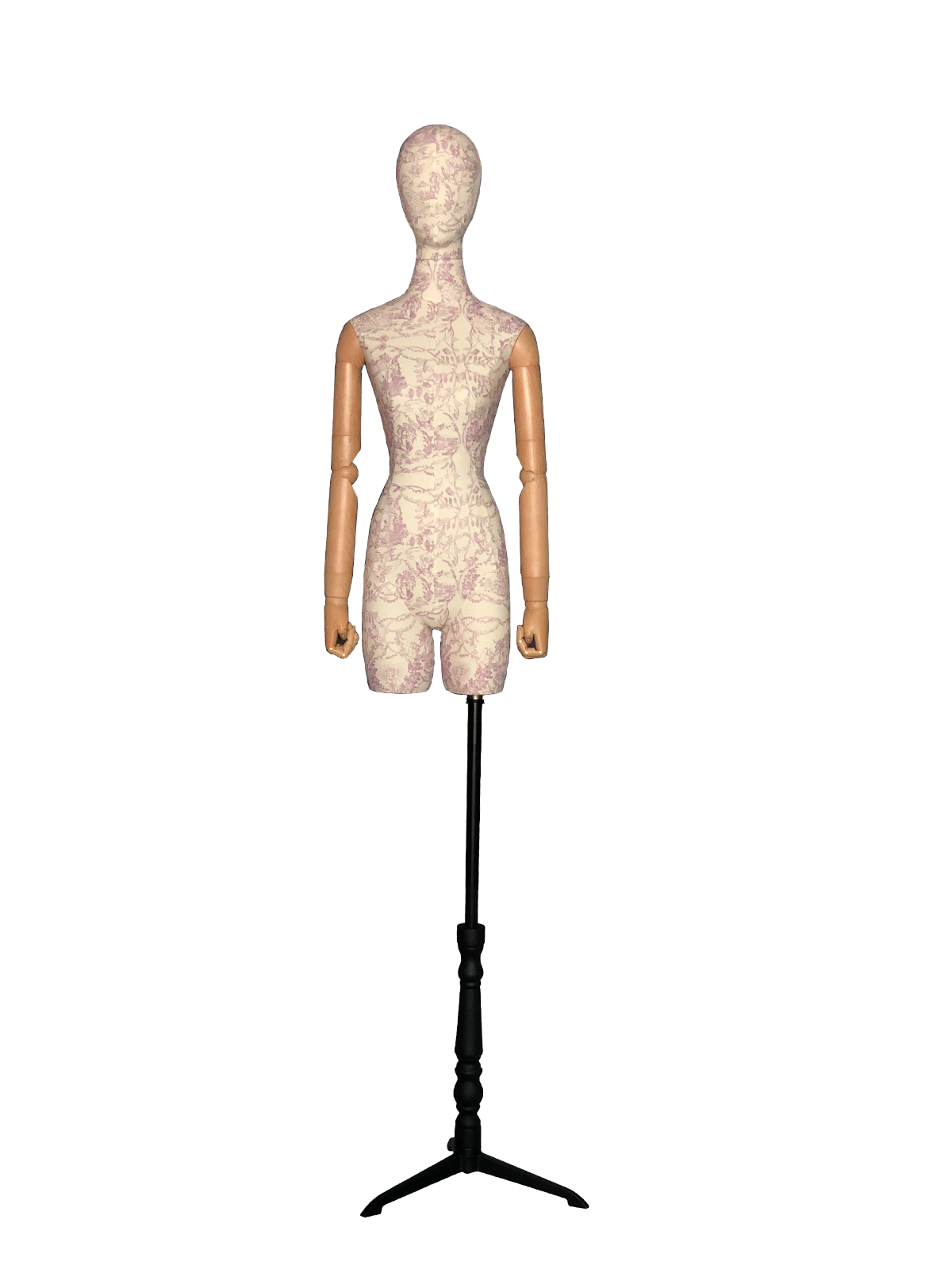 มุมมองด้านหน้าของหุ่นจำลองลำตัวหญิงของ XINTU ซึ่งมีลวดลายผ้าดอกไม้ หัวแบบนามธรรม แขนไม้ และขาตั้งโลหะสีดำ.