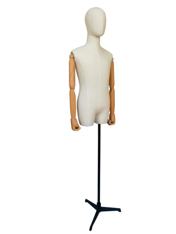 Angled view of a XINTU male torso mannequin, featuring an off-white fabric body, abstract head, articulated beech wood arms, and a black stand.white linen male mannequin with adjustable wooden arms and black tripod base