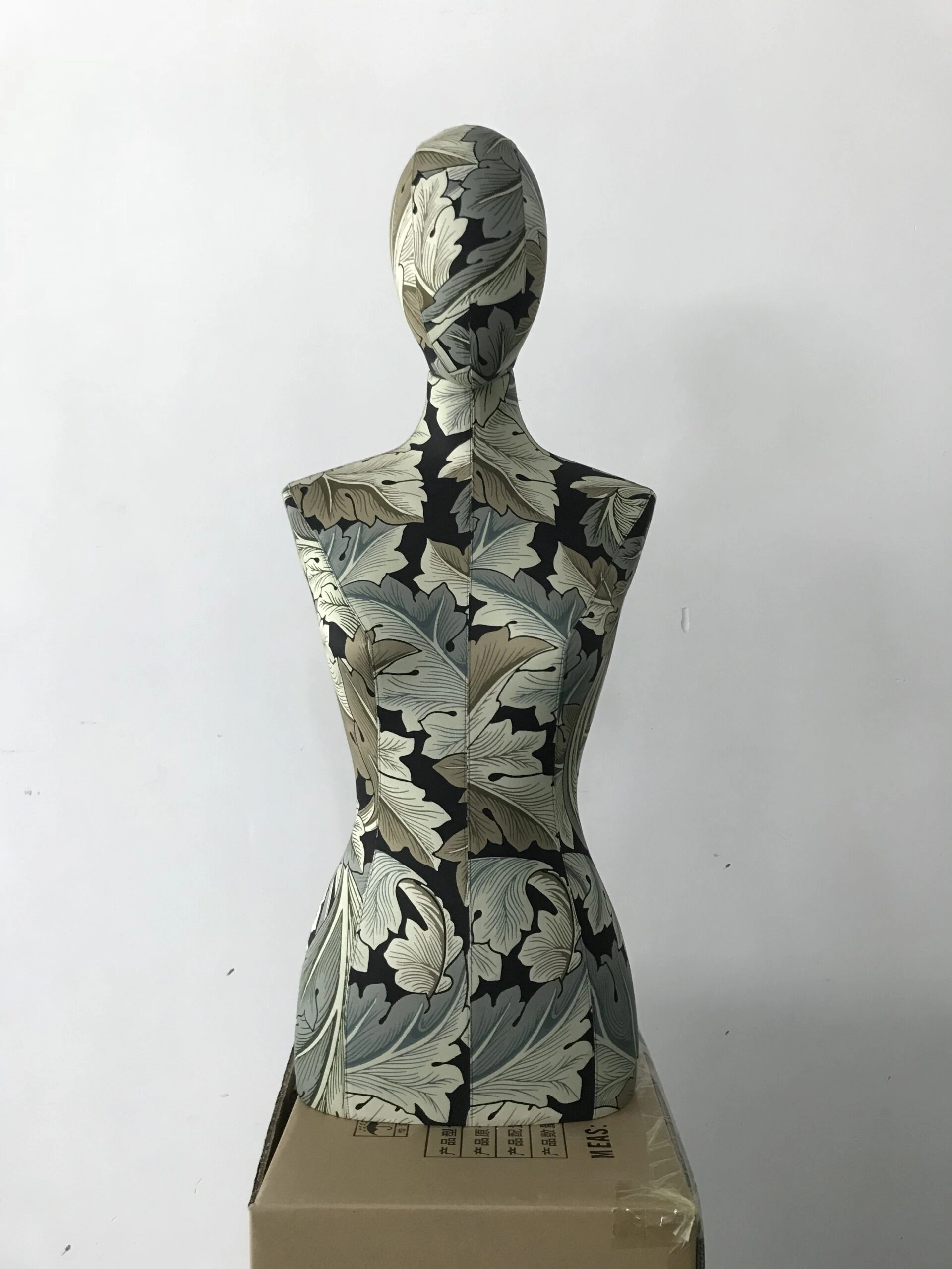 LOEWE project: front view of fabric-covered half-body display piece