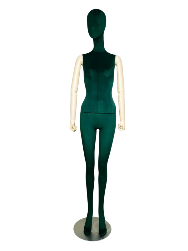 Front view of a XINTU full-body female mannequin, featuring a dark green velvet body and abstract head, with contrasting white adjustable arms, on a round metal base.