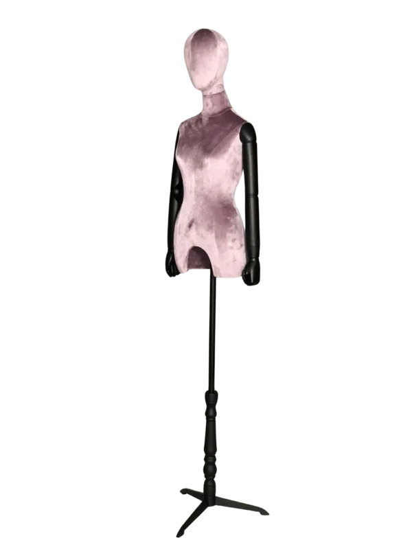 Angled view of a XINTU female half-body mannequin, upholstered in pinkish-purple velvet, with black adjustable arms and a black stand.