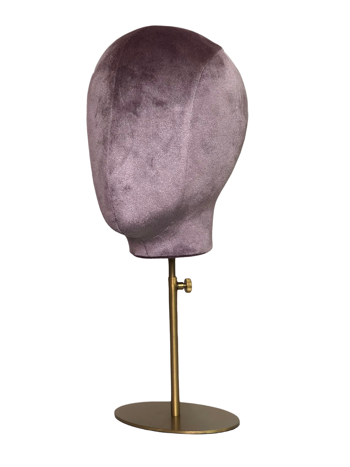 Vista en ángulo de una cabeza de maniquí abstracta XINTU, tapizada en terciopelo rosa púrpura, sobre un soporte metálico redondo dorado ajustable.