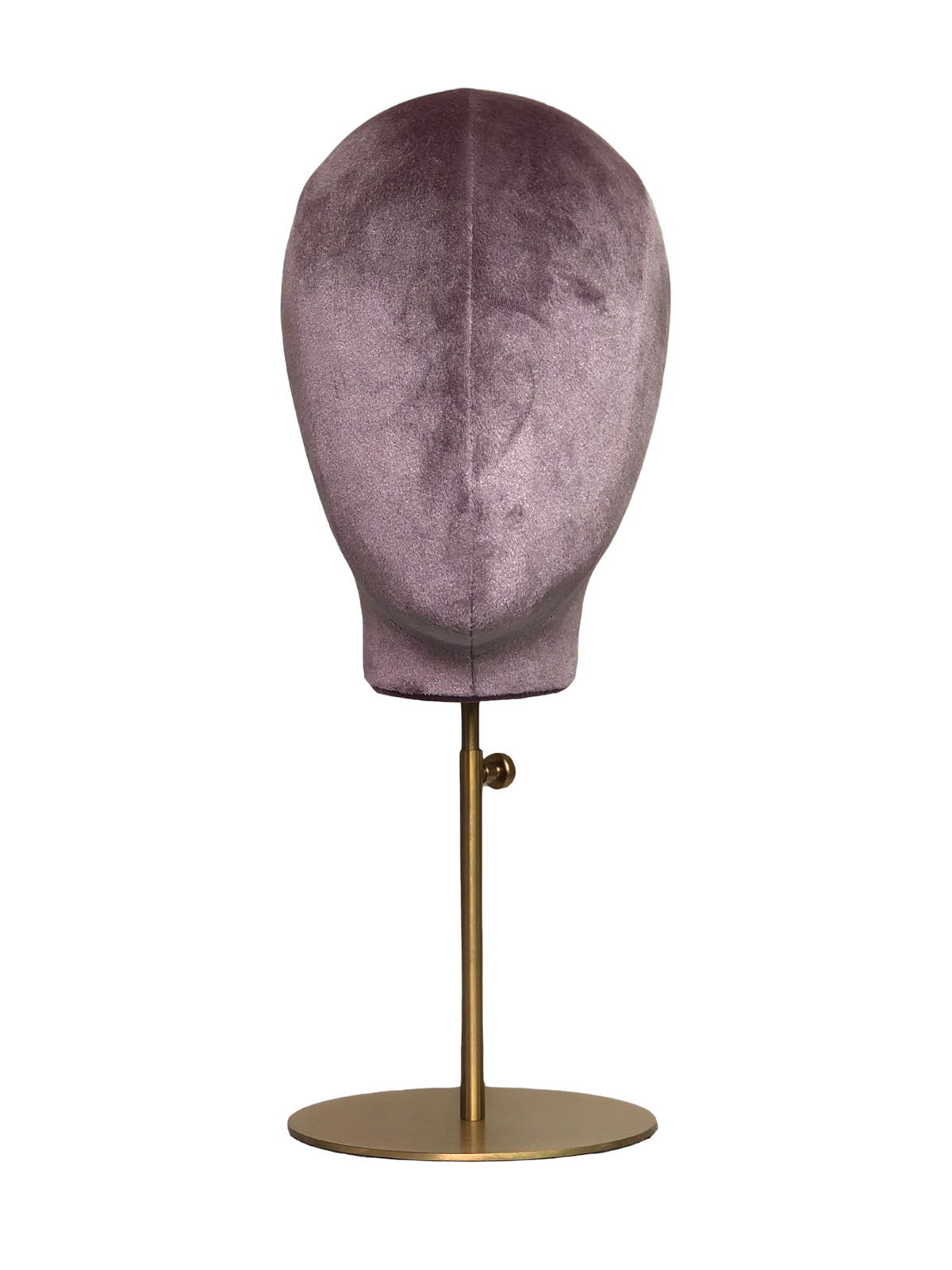 Vista frontal de una cabeza de maniquí abstracta XINTU, tapizada en terciopelo rosa púrpura, sobre un soporte redondo de metal dorado.