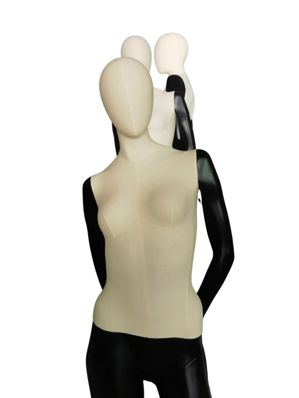 Angled close-up of a XINTU female mannequin, featuring an off-white fabric torso and abstract head, with glossy black arms.