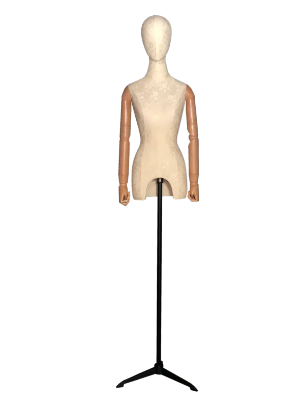 Front view of a XINTU female torso mannequin, covered in white lace fabric, with an abstract head, wooden arms, and a black stand.